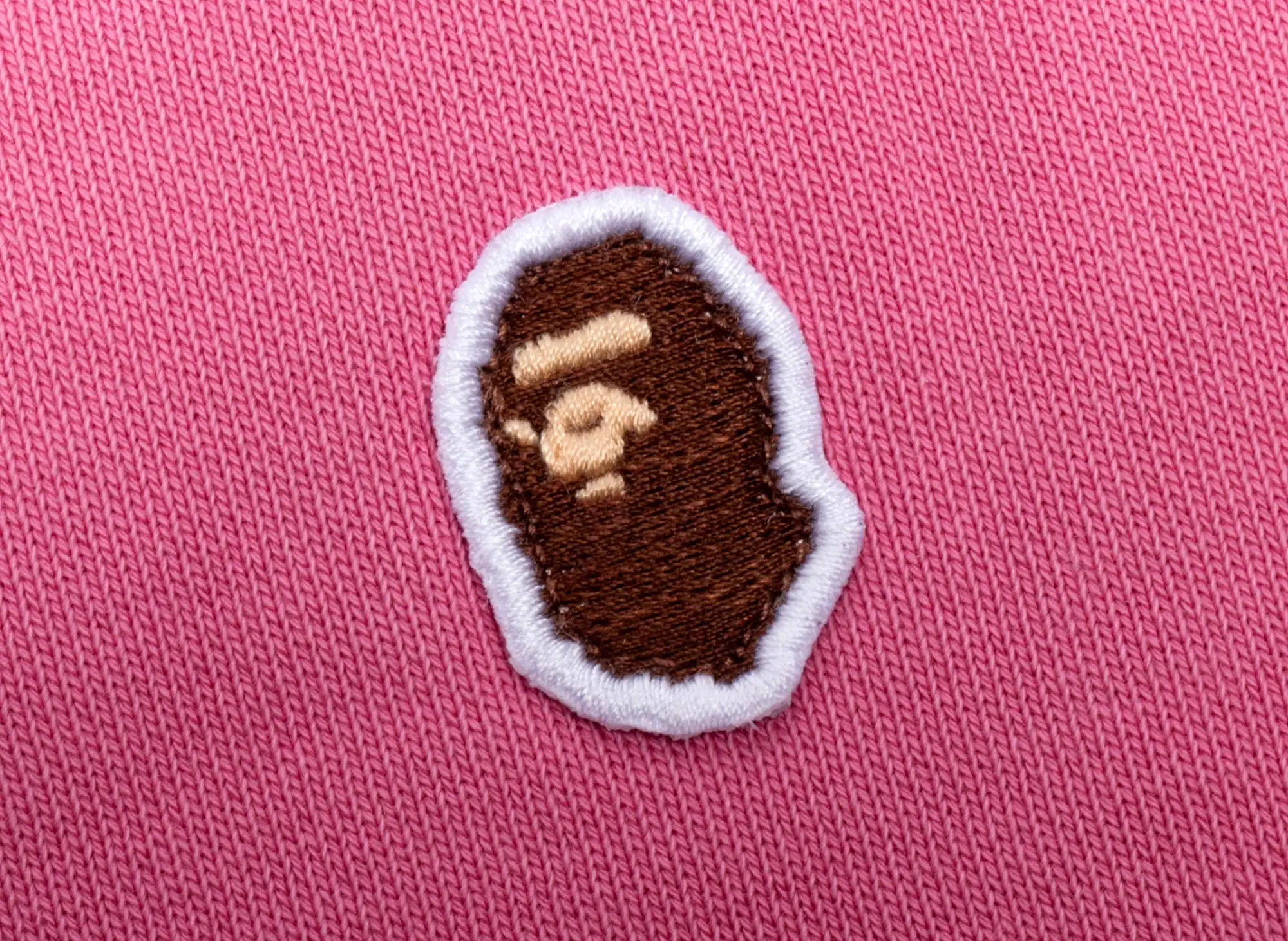 A Bathing Ape Ape Head One Point Overdye Crewneck in Pink